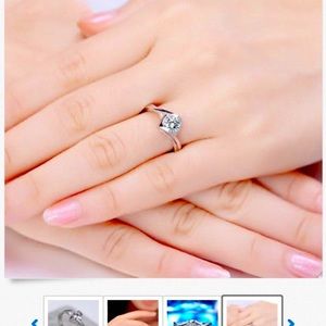 Silver heart CZ solitaire ring